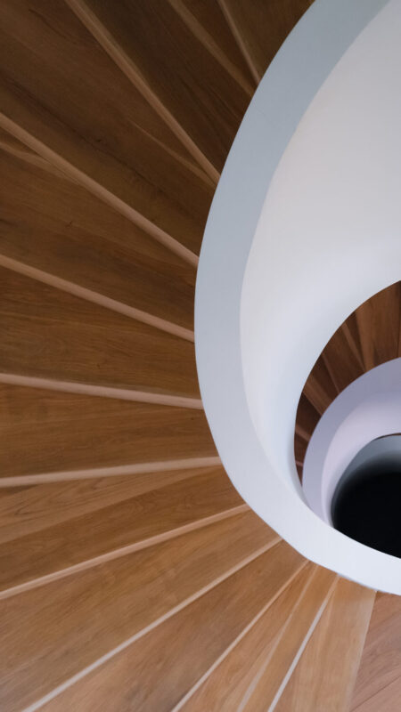 Spiral architectural form guiding movement through continuous spatial transition.